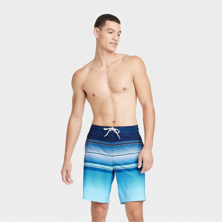 Get ready for exciting sunny escapades in style and comfort with these Suspension Striped Swim Shorts from Goodfellow & Co™. The regular-fit swim shorts are made from soft and stretchy fabric with a boxer brief liner for added comfort both in and out of the water. The swim trunks feature an adjustable drawstring closure that helps you find the best fit, along with side and back pockets that allow you to carry your essentials. Featuring an allover striped pattern for cool style, simply pair them Casual Blue Shorts For Warm Weather, Blue Bottoms For Warm Weather With Short Length, Blue Short-length Bottoms For Warm Weather, Blue Shorts For Warm Weather, Blue Bottoms For Outdoor Beach Season, Blue Bottoms For Beach Season Outdoor, Blue Bottoms For Beach Season Outdoor Activities, Relaxed Fit Blue Bottoms For Outdoor, Blue Relaxed Fit Bottoms For Outdoor