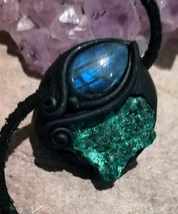 Unique Handcrafted Green stone Jewelry featuring raw malachite and  labradorite.  High vibration healing crystals honoring Gaia. - Aprox 1- 1.5  inches - Will include suede vegan cord for complete necklace - Please allow 6 to 12 days for delivery Healing with Malachite ♥ Calming ♥ Loyalty ♥ Leadership ♥ Protection ♥ Wisdom ♥ Comfort ♥ Balance ♥ Peace ♥ Self-understanding ♥ Positive transformation ♥ Healing Thank you for choosing to support handmade! Spiritual Malachite Necklace For Healing, Healing Malachite Gemstone Necklace, Spiritual Malachite Jewelry With Natural Stones, Spiritual Malachite Jewelry For Healing, Nature-inspired Raw Stone Jewelry For Healing, Spiritual Healing Emerald Jewelry, Spiritual Emerald Jewelry For Healing, Nature-inspired Raw Stone Healing Jewelry, Labradorite Crystal Necklaces With Natural Stones For Healing