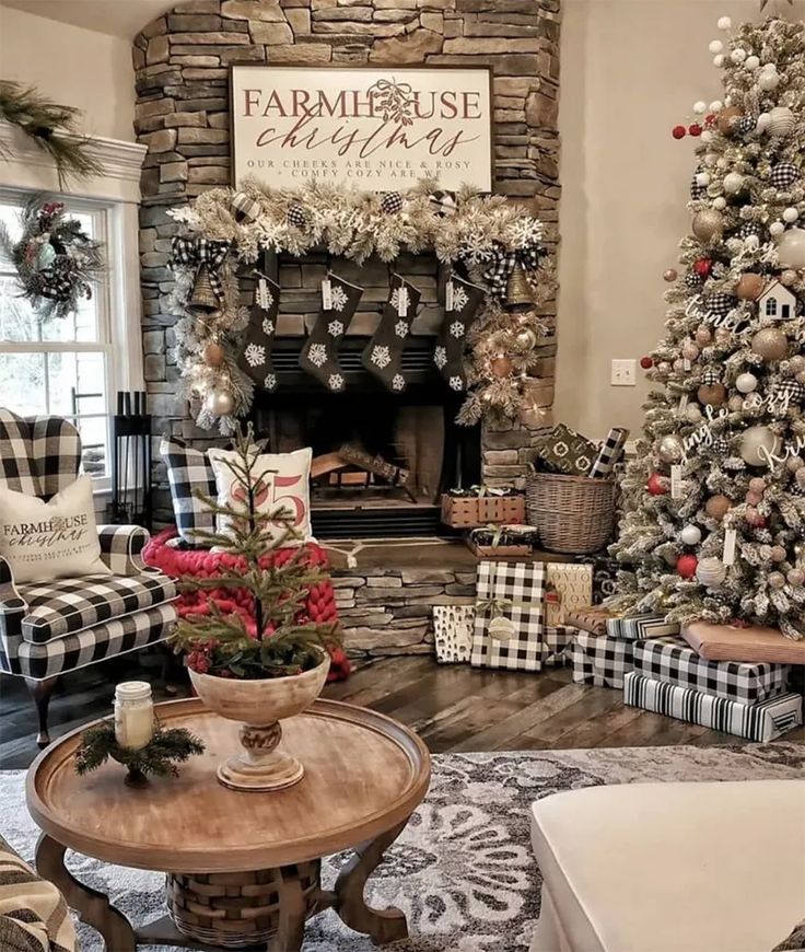 a living room filled with furniture and a christmas tree in front of a fire place