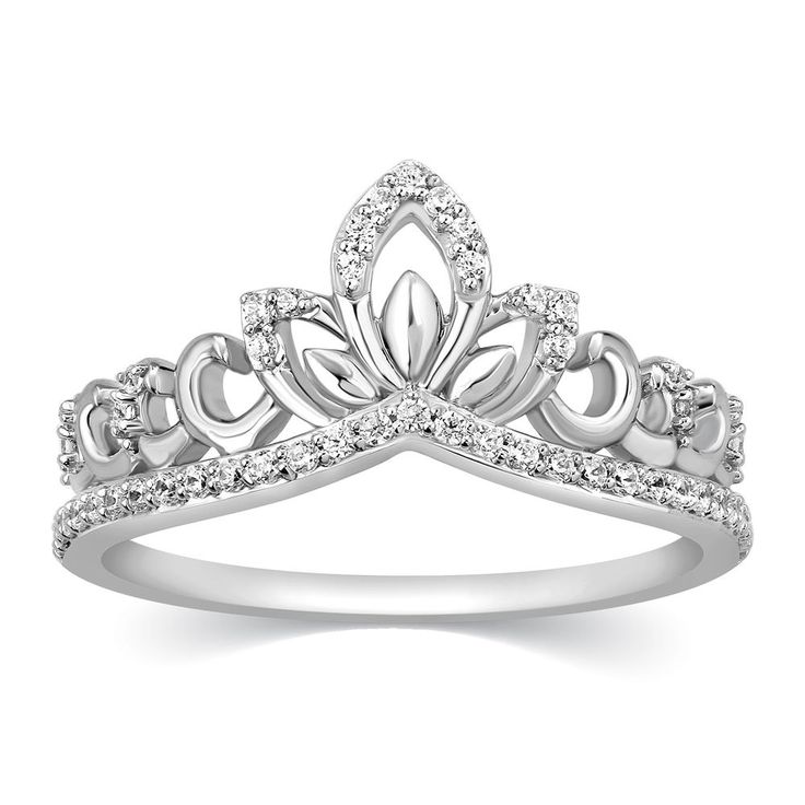 a white gold crown ring with diamonds on it