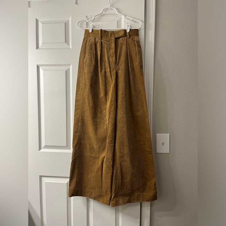 This Pants Are Super Cute, I Got Them About A Year Ago Thinking I Would Get Them Hemmed (I Am Quite Short, 5ft) But, Spoiler Alert, I Never Did. They Have Never Been Worn, Just Have Been Sitting In My Drawer The Whole Time. They Are A Size 2, And Are Wide, Straight Legged. Spring Corduroy Full Length Pants, Spring Corduroy Wide Leg Pants, Chic Full-length Corduroy Pants, Chic Full Length Corduroy Pants, Chic Corduroy Bottoms With Pockets, Fitted Wide Leg Cotton Pants For Fall, Fitted Corduroy Wide Leg Bottoms, Fitted Wide Leg Corduroy Pants, Fitted Cotton Wide Leg Pants For Fall