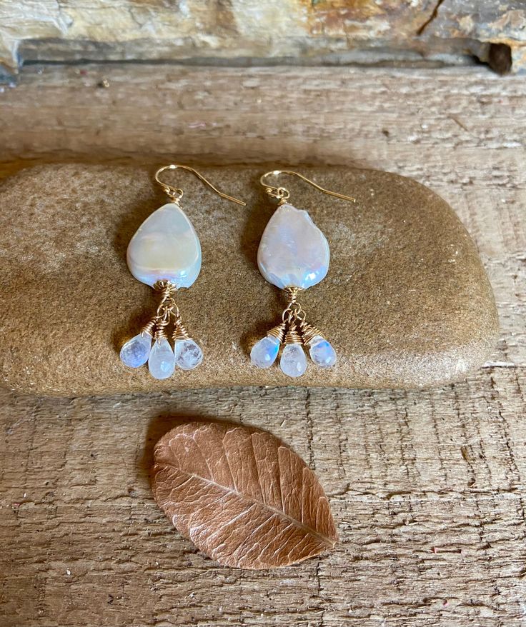 Gold filled dangle earrings with freshwater pearls and faceted moonstone gemstones Elegant Faceted Opal Jewelry, Elegant Dangle Teardrop Earrings With Natural Stones, Elegant Natural Stone Dangle Teardrop Earrings, White Drop Earrings In 14k Gold Filled, White 14k Gold Filled Drop Jewelry, Dainty Natural Stone Dangle Earrings, Fine Jewelry White Long Drop, 14k Gold-filled Teardrop Natural Stone Earrings, 14k Gold-filled Natural Stone Teardrop Earrings