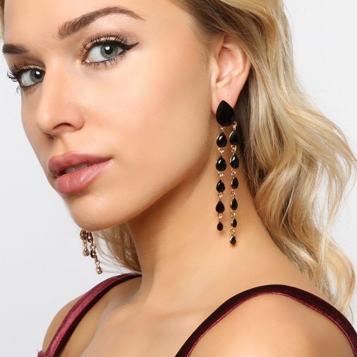 Feel elegant in these teardrop dangle earrings that flow with any outfit and elongate your neck. Cascading teardrop rhinestones that dangle in two tiers from large to small sizes with a post backing great for girls, teens, and women that have their ears pierced! These beautiful statement jewelry will shine like a diamond catching everyone’s eyes! Size• Length: 3.75 in (9.53 cm)• Width: 0.5 in (1.27cm) Quality These well designed post backing earrings use an eco-friendly, lightweight, strong gold Metal Drop Crystal Earrings For Party, Teardrop Metal Chandelier Earrings For Party, Metal Teardrop Chandelier Earrings For Party, Crystal Teardrop Earrings For Party, Glamorous Evening Teardrop Drop Earrings, Party Long Drop Chandelier Earrings, Long Drop Teardrop Earrings For Party, Crystal Long Drop Chandelier Earrings, Long Drop Crystal Chandelier Earrings