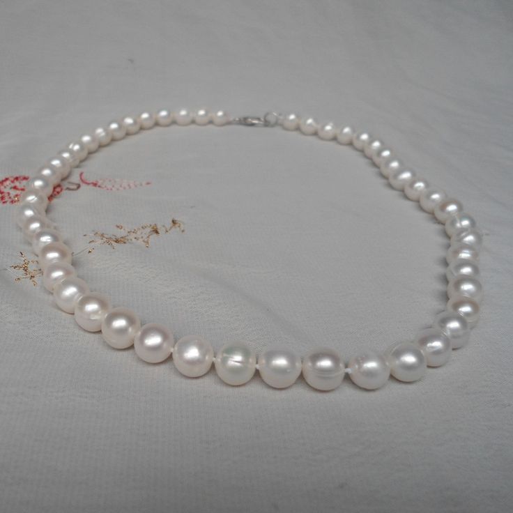 Description jewelry: pearl necklace pearl colour: white Pearl Diameter: 7-8mm Pearl category: real Feshwater pearl Pearl Body: with tiny blemish or ring Pearl grade: AA+ Pearl Luster: high Pearl Shape: suborbicular ( as shown) Necklace length: select Clasp: lobster clasp, The pearls are individually hand knotted . Packing: Beautiful Pouch Click on the image(s) for larger view Matching 2 layer necklace: https://www.etsy.com/listing/873982806/white-pearl-necklace7-8mm-freshwater?ref=shop_home_feat Formal Pearl White Necklace With Round Beads, White Pearl Necklace With Round Beads For Formal Occasions, Classic Pearl Necklace For Wedding With 8mm Beads, Elegant Pearl Necklace With 8mm Beads As Gift, Classic Wedding Pearl Necklace With 8mm Beads, Formal White Single Strand Pearl Necklace, White Single Strand Pearl Necklace With Round Beads, Classic Pearl Necklace With Round Beads, Classic Pearl Necklace With Round Beads As Gift