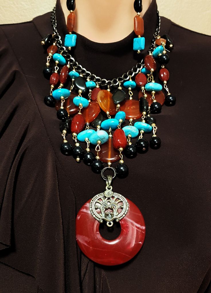 Natural gemstone mixed bead necklace, made with different shaped carnelian, onyx and turquoise beads with focal pendant ring. Christmas or unique gift for Mom. The length can be adjusted. Necklace measures 34 inches with a lobster clasp. In my collection you can find this necklace in a variety of colors. I am constantly creating new pieces to add to my collection, so I invite you to follow my shop for exclusive new releases. Your purchase will come carefully packaged in an organza sachet. Mixed Bead Necklace, Mixed Beads Necklace, Couture Necklace, Multi Necklace, Multi Coloured Necklaces, Unique Gifts For Mom, Pendant Ring, Color Necklace, Pendant Rings