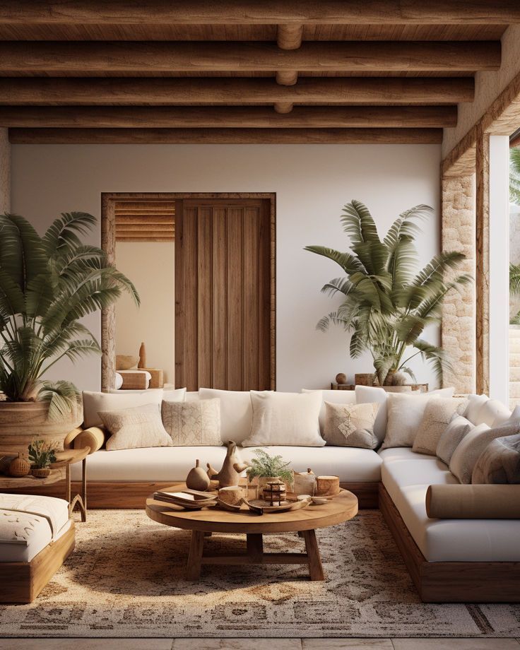 a living room filled with lots of furniture and plants