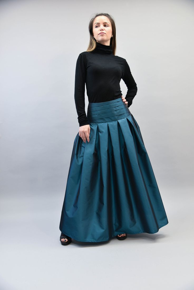 "Pleated, fancy and extra long, with a full A-line silhouette and made of high quality taffeta, this skirt is the perfect garment for any formal occasion or fancy event. Classy and elegant, be sure you will look chick and trendy anywhere you go. MATERIALS: high quality taffeta --------------------------------------- If you have any questions about the item or have any personal requirements about the garment, please do not hesitate to send us a message, our team is available 24/7, or check out ou Black Skirt Formal, Long Skirt And Top, Fancy Event, Long Maxi Skirt, Handmade Skirts, High Waisted Pleated Skirt, Formal Skirt, Skirt Pleated, High Waist Skirt