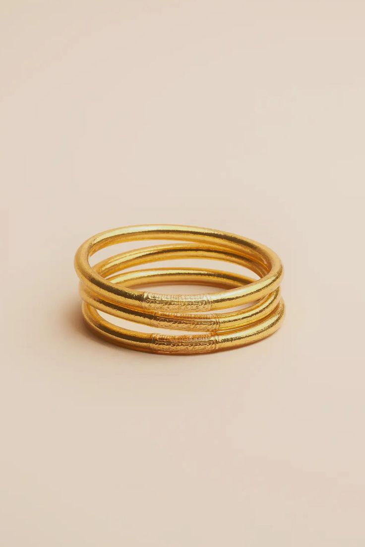 Gold Bohemian Bracelets For Rituals, Gold Stackable Wrap Bracelet, Gold Stackable Wrap Bracelet Bangle, Spiritual Stackable Yellow Gold Bracelets, Gold Spiritual Hand Wrapped Bracelets, Spiritual Hand Wrapped Gold Bracelets, Spiritual Hand-wrapped Gold Bracelets, Adjustable Brass Bracelets For Rituals, Stackable Yellow Gold Brass Bracelets