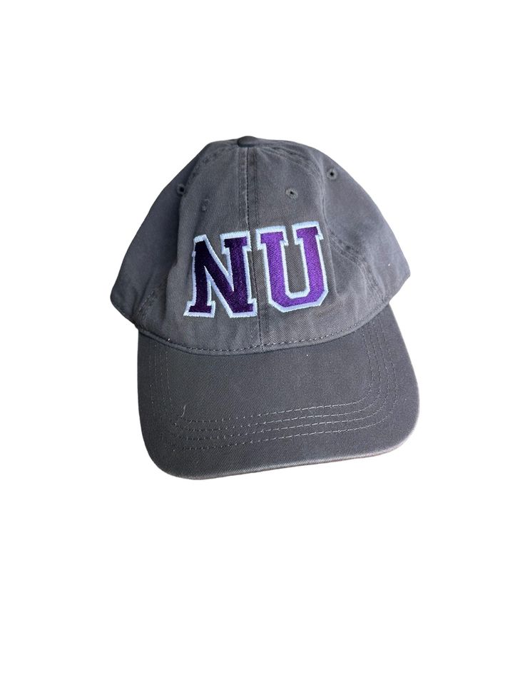 Show off your school spirit with this vintage Niagara University varsity letter hat. With its adjustable strapback and multi-color design, this cap is the perfect addition to any vintage accessories collection. Made by Cap America, this original piece is a must-have for any fan of the university. Whether you're wearing it to a game or just out and about, this hat is sure to turn heads and show your support for Niagara University. Vintage Baseball Cap For College, Vintage College Baseball Cap, Vintage Cap For College, Vintage Curved Brim Hats For College, Vintage Gray Baseball Cap With Curved Bill, Retro Baseball Cap For College Baseball Season, Retro Hats For Baseball Season, Vintage Snapback Baseball Cap With Letter Patch, Retro Baseball Cap With Letter Patch