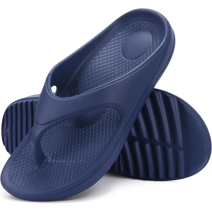 Dive into a realm of comfort and practicality with these Contoured Comfort Flip Flops. They're not just a stylish addition to your summer footwear but also offer a supportive experience with every step. Designed with a focus on comfort and durability, they will be your go-to choice for beach days, backyard barbecues, or simply repose at home. Features: Size: These flip flops come in a range of sizes to ensure a proper fit for various foot dimensions. Material: Made with a durable synthetic mater Comfortable Slip-resistant Blue Sandals, Comfortable Non-slip Blue Flip Flops, Comfortable Blue Non-slip Flip Flops, Blue Synthetic Outdoor Slippers, Blue Slip-on Eva Sandals, Blue Round Toe Eva Flip Flops, Blue Lightweight Synthetic Sandals, Lightweight Blue Synthetic Sandals, Adjustable Blue Flip Flops With Arch Support