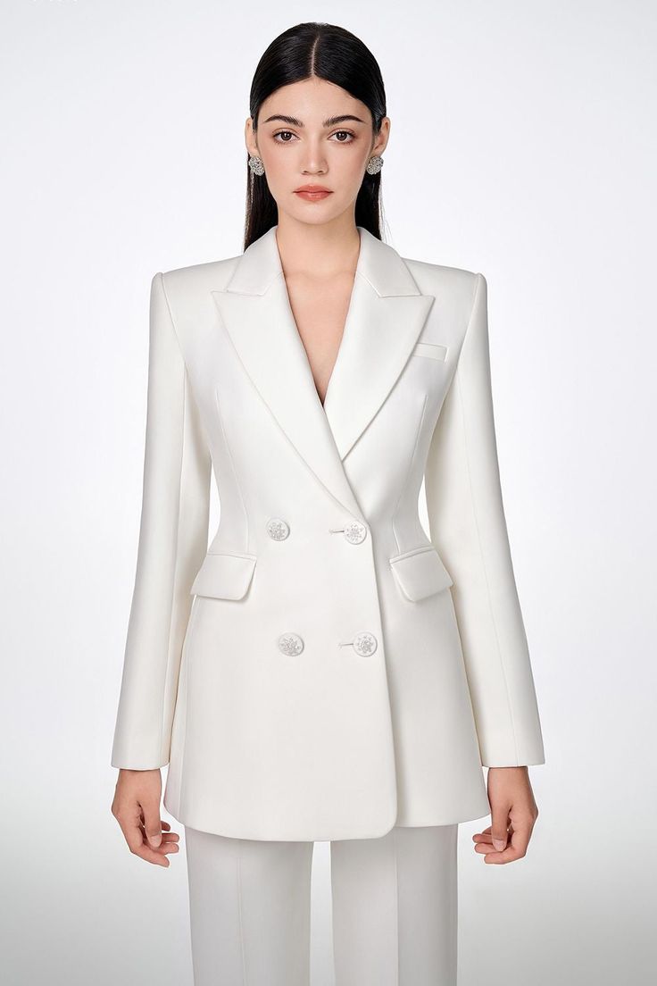 This set is a perfect choice for special occasions. Crafted from crepe fabric, it features a structured peak lapel design and is tailored to a slim-fit silhouette for a sophisticated look. This piece is sure to add elegance to any wardrobe. Luxury Straight Leg Pantsuit With Pressed Crease, Luxury Pantsuit With Pressed Crease And Straight Hem, Luxury Notch Lapel Pantsuit For Office, Luxury Structured Pantsuit With Hidden Button Closure, Luxury Structured Tuxedo Pantsuit, Luxury Pantsuit With Pressed Crease For Office, Luxury Elegant Pantsuit With Concealed Placket, Luxury Formal Pantsuit With Concealed Placket, Luxury Slim Fit Professional Blazer