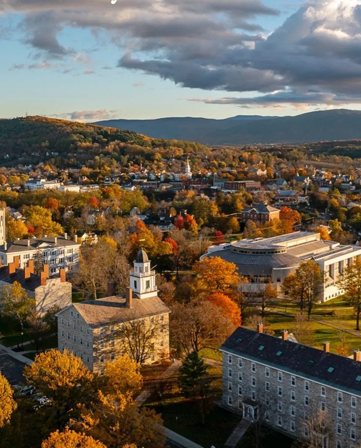 an aerial view of the campus and surrounding buildings in autumn time with colorful leaves on trees