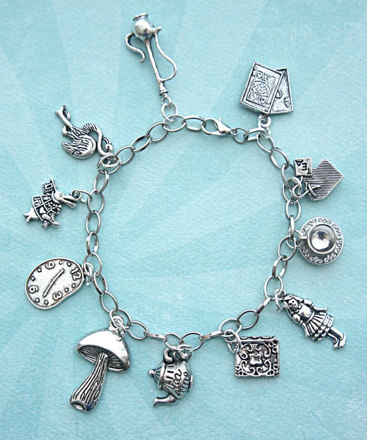 a silver bracelet with charms on it and the price is $ 15 95 at shop