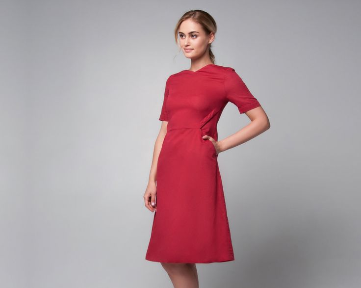 The red office dress is a very elegant combination of color and silhouette. This linen dress definitely attracts an attention to its owner. Due to wide skirt it is very comfortable but emphasizes the figure at the same time. Features of the model:  * made of linen/rayon mix (50%/50%) * rayon lining * trapeze skirt * below the knee length * short sleeve * V-neckline * zipper on the back IMPORTANT NOTICE: please agree with us your size before making an order. MEASUREMENT CHART: 6 (USA) / 36(EU) / 42 (UA) - 33"/26"/35" 8 (USA) / 38(EU) / 44 (UA) - 34,5"/28"/36,5" 10 (USA) / 40(EU) / 46 (UA) - 36"/29"/38" 12 (USA) / 42(EU) / 48 (UA) - 38"/31"/39" 14 (USA) / 44(EU) / 50 (UA) - 39,5"/32"/41" 16 (USA) / 46(EU) / 52 (UA) - 42"/34"/44" Model height on photo - 178 cm PROCESSING TIME: 1-3 business da Elegant Short Sleeve Linen Dress For Work, Elegant A-line Burgundy Dress, Elegant Burgundy A-line Dress, Formal Knee-length Linen Dress, Elegant A-line Linen Dress For Work, Fitted A-line Burgundy Midi Dress, Burgundy Fitted A-line Midi Dress, Burgundy A-line Midi Dress For Formal Occasions, Chic Burgundy A-line Dress