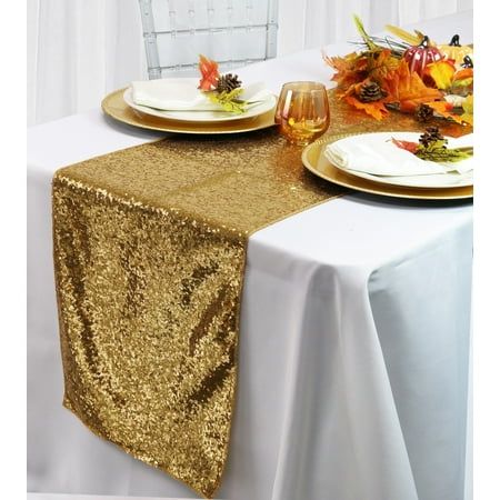 the table is set with gold sequins and place settings for an autumn celebration