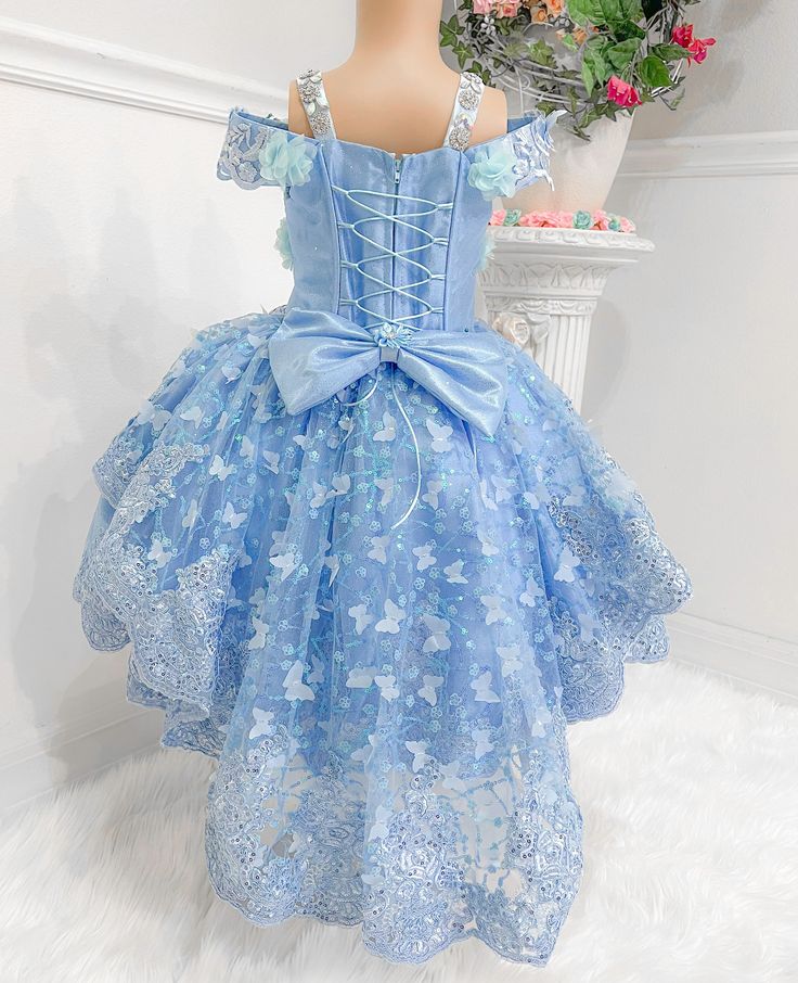 Immerse your child in a world of make-believe with this delightful Cinderella costume. Its magnificent blue hue is designed to ensure your little one stands out, no matter where their adventures take them. Central to this beautiful ensemble is an elegant, zippered corset crafted with comfort and fit in mind. This exceptional feature allows the costume to be adjusted perfectly to your child's figure, providing them with hours of uninterrupted and comfortable playtime. The highlight of this costum Princess Style Fairy Dress For Fancy Dress, Princess Style Fitted Fairy Dress For Fancy Dress, Fitted Princess Fairy Dress For Fancy Dress, Blue Fairytale Princess Dress For Dress-up, Princess Style Fitted Blue Ball Gown, Blue Princess-style Fitted Ball Gown, Princess Style Fitted Fairy Dress For Pageant, Fairytale Princess Dress For Pageants, Themed Party Dresses For Cosplay Events