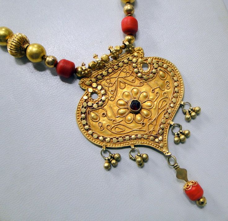 "Vintage antique tribal old solid gold and red color touchstones beads necklace. Fully handmade collection piece in good condition. Length-32 cm(12.6\") free size, easy to adjust the length by moving toggle. Size of pendant-9/6 cm, weight-62.350 grams." Handmade Gold Beaded Necklaces For Traditional Ceremonies, Handmade Traditional Temple Necklace For Festivals, Traditional Handmade Temple Necklace For Festivals, Traditional Gold Bead Necklaces For Ceremonies, Traditional Detailed Beaded Necklaces For Festivals, Traditional Intricate Beaded Necklaces For Festivals, Traditional Gold Beaded Necklaces For Ceremonies, Traditional Kundan Necklace With Polished Beads For Puja, Gold Beaded Necklaces For Traditional Ceremonies