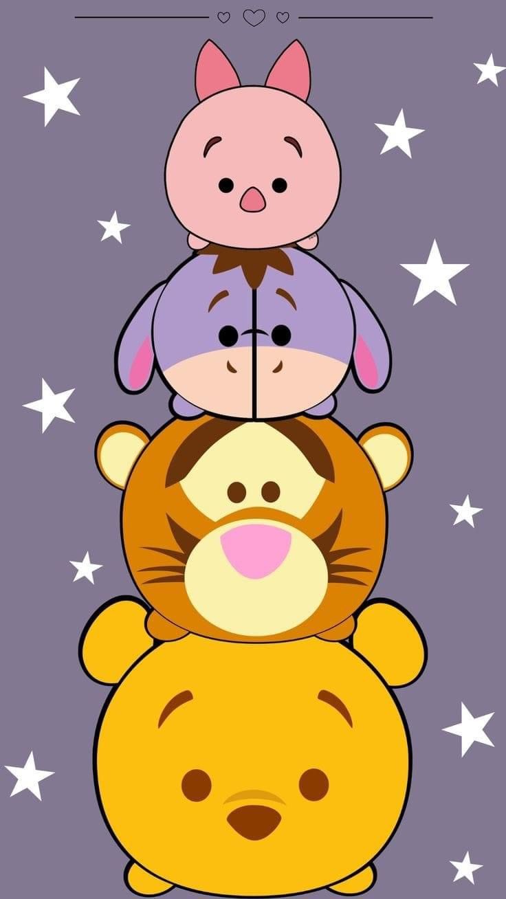 winnie the pooh and tigger stacked on top of each other with stars in the background