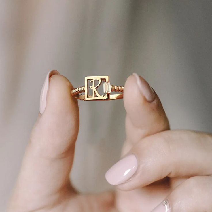 Personalized Birthstone Letter Ring - Celebrate your unique identity with our Custom Birthstone Letter Ring. This delicate and meaningful ring combines your initial with a sparkling birthstone, creating a truly one-of-a-kind accessory.Tiny Square Minimalist Design - Embrace the charm of simplicity with our Tiny Square Minimalist Ring. The sleek and elegant square design adds a modern touch to the classic initial ring, making it perfect for everyday wear.Skinny and Stylish - Our Skinny Letter Rin Personalized Adjustable Ring Jewelry, Adjustable Promise Ring With Name, Adjustable Name Jewelry For Promise Ring, Dainty Open Stackable Rings For Gift, Valentine's Day Gift Birthstone Open Ring, Valentine's Day Gift Open Birthstone Ring, 14k Gold Stackable Initial Ring As Gift, Adjustable Dainty Initial Ring For Promise, Adjustable Initial Name Ring