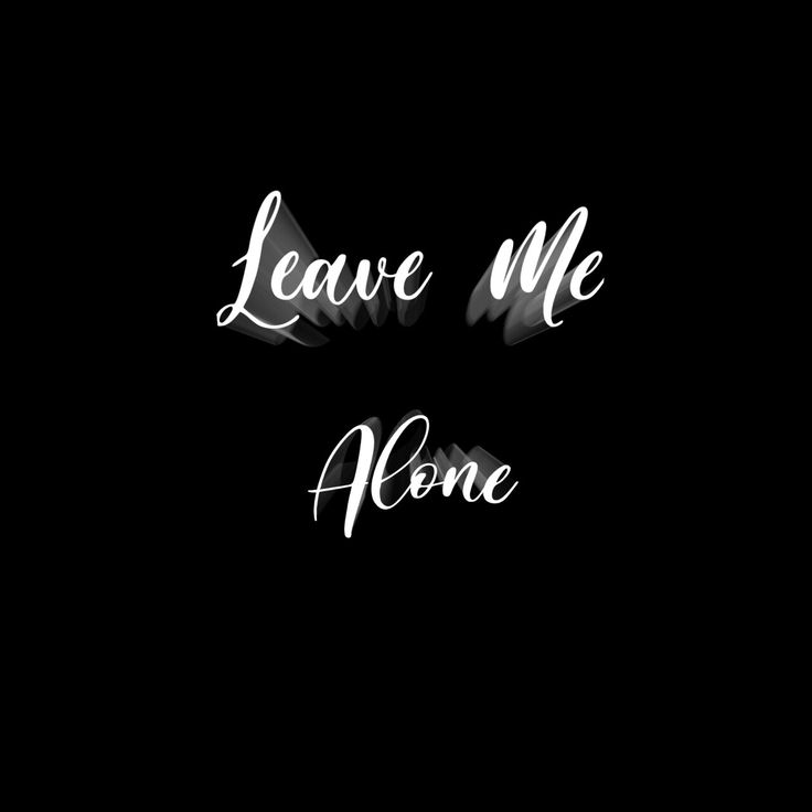 leave me alone written in white ink on a black background