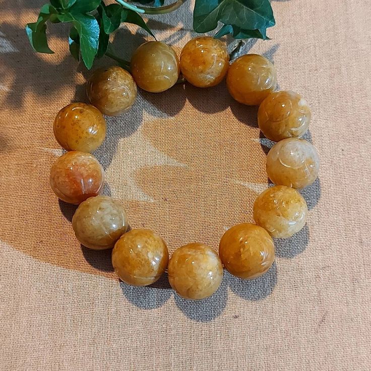 "DJade-New Certified Natural Yellow Grade A Jadeite Jade Beaded Bracelet Best Gift Include certificate and jewelry pouch Item size: (Manual measurement,please allow +- 0.5mm size difference) Bracelet: 8\"-9\"(Beaad size: 17mm) Weight: 85.83g The item pictured is the exact one you will receive. Thanks." Vintage Gemstone Beads Bracelets As Gift, Vintage Beaded Bracelet With Natural Stones For Gifts, Large Beads Stretch Bracelet As Gift, Large Beads Stretch Bracelet Gift, Large Beads Stretch Bracelet For Gifts, Stretch Bracelet With Large Beads As A Gift, Jade Beads With Large Beads For Gifts, Jade Beads Gift, Brown Jade Round Beads Jewelry