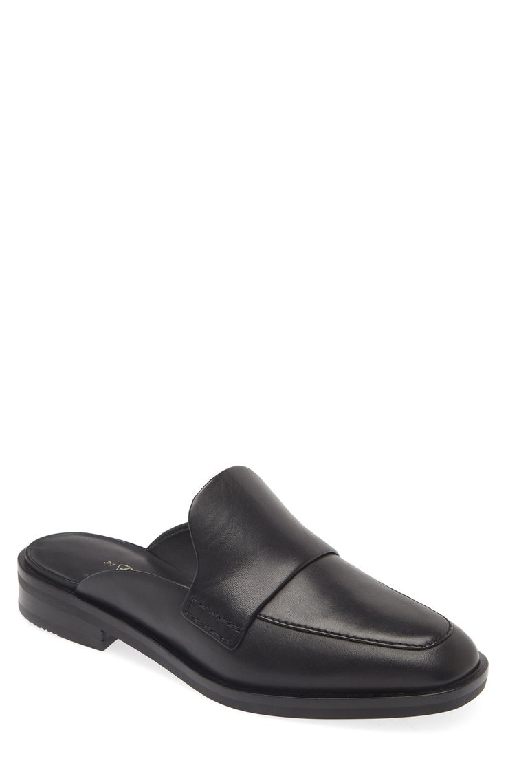 This loafer-style mule in smooth leather is a modern essential for casual and office looks. Leather upper, lining and sole Imported Classic Flat Slip-ons For Business, Leather Closed Toe Slip-ons For Business Casual, Sleek Round Toe Slip-ons For Office, Sleek Office Slip-ons With Round Toe, Calf Leather Pointed Toe Slip-ons For Work, Luxury Slip-ons With Leather Sole For Work, Luxury Leather Sole Slip-ons For Work, Modern Calf Leather Loafers For Business Casual, Formal Calf Leather Slip-ons For Spring