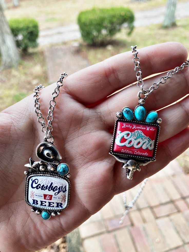 This Rocky Mountain Water Necklace will add a wild west touch to any outfit. It's the perfect accessory for a country music fan, a rodeo enthusiast, or anyone who just loves a cold one. Be the life of the party with this unique rodeo-style necklace! **Necklaces sold separately. Other featured necklace is our Cowboys & Beer Necklace** Approx: 18" Color: Red Lobster claw closure with extending hooks Lead & nickel compliant Western Style Necklaces For Western-themed Events, Handmade Western Style Necklace, Nickel-free Western Jewelry For Western-themed Events, Vintage Handmade Necklace For Western-themed Events, Handmade Vintage Necklace For Western-themed Events, Western Style Silver Necklace For Festivals, Western Shopping, Beer Necklace, Water Necklace