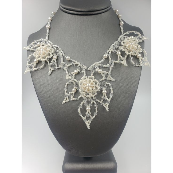 This One Of A Kind, Vintage Handmade Necklace Features Seed Beads, Faux Pearls, And Clear Beads Threaded Into A Bib Which Has A “Lace” Look Necklace Is Perfect For A Wedding! Measures Approx. 16”L Plus A 2-1/2” Extender Bib Measures Approx. 3-3/8”L X 7”W Antiqued Goldtone Extender And Lobster Claw Clasp. One O-Ring Has A Tiny Bit Of Metal Wear. There Is An Elegant Beaded Design At The End Of The Extender. Excellent Vintage Condition And Will Arrive Carefully Packaged In A Gift Box. Elegant Pearl Necklace With Silver Beads For Wedding, Crystal Embellished Necklaces For Wedding, Wedding Crystal Embellished Necklace, Beaded Pearl Bridal Accessories For Wedding, Pearl Bridal Necklace With Beaded Chain, Pearl Bridal Necklace With Beaded Chain For Wedding, Formal Pearl Embellished Jewelry, Formal Embellished Pearl Jewelry, Elegant White Embellished Necklaces