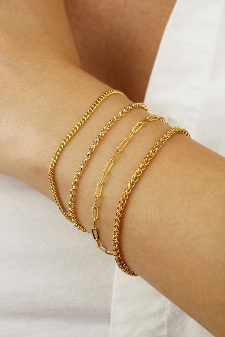 14k Gold Filled Chain Bracelet. These are Dainty and Discrete Yet Striking and Eye-Catching. A Minimalist Gold Bracelet That You Can Wear on Its Own or Layer up. Your Perfect Everyday Companion. If You Are Looking for A Quality Chain Bracelet that Keeps its Shine, this is Ideal For You.  Tarnish Resistant and Hypoallergenic Bracelet. DIMENSIONS Material: 14k Gold Filled Bracelet Length: 7.5 Inch (6.5 Inch Plus 1 Inch Extension) Style A - 2.3mm Curb Chain Bracelet Style B - 2.5mm Rolo Chain Brace Minimalist Gold Plated Curb Chain Bracelets, Minimalist Gold-plated Curb Chain Bracelets, Dainty Curb Chain Bracelets For Formal Occasions, Dainty Curb Chain Bracelet For Formal Occasions, Dainty Curb Chain Bracelet For Formal Events, Minimalist Adjustable Curb Chain Bracelets, Minimalist Adjustable Curb Chain Bracelet, Delicate Chain Bracelets As Gift, Delicate Chain Bracelet Gift