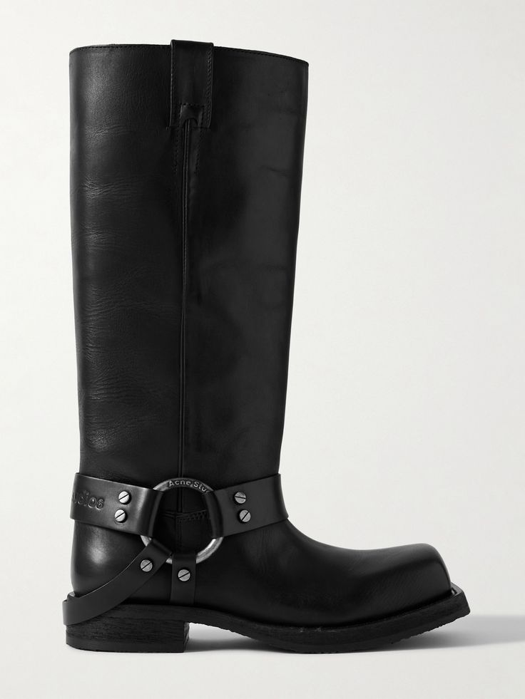 Biker boots from the 2010s are not only back in style, but also made even cooler in the hands of Acne Studios. Made from leather, this square-toe pair is decorated with a silver-tone metal O-ring and studded straps. Style them with midi skirts or tuck the legs of your jeans inside. <br><br>- By purchasing this product, you are supporting responsible leather manufacturing through <a href="https://www.leatherworkinggroup.com">Leather Working Group.</a><br>&… Acne Studios Shoes, Porter Bag, Black Biker Boots, Coyote Ugly, Net Sustain, Summer Style Guide, Leather Knee Boots, High Leather Boots, Midi Skirts