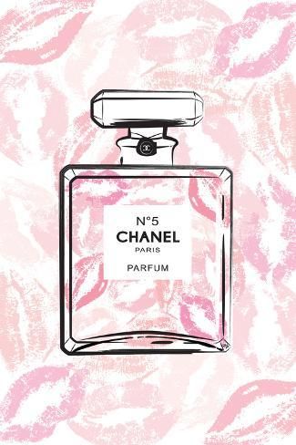 a chanel perfume bottle on a pink background