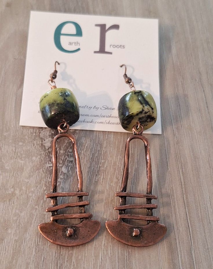 These boho style earrings feature abstract copper dangles with yellow turquoise gemstone beads. These earrings measure 3.5" in length.  They will ship in a gift box or bag via USPS with tracking info provided. Artsy Copper Drop Earrings, Bohemian Brown Electroformed Earrings, Artsy Copper Dangle Earrings, Green Bohemian Earrings With Copper Wire, Bohemian Green Earrings With Copper Wire, Green Bohemian Copper Wire Earrings, Artsy Copper Jewelry With Matching Earrings, Bohemian Bronze Earrings With Copper Wire, Turquoise Artisan Electroformed Earrings