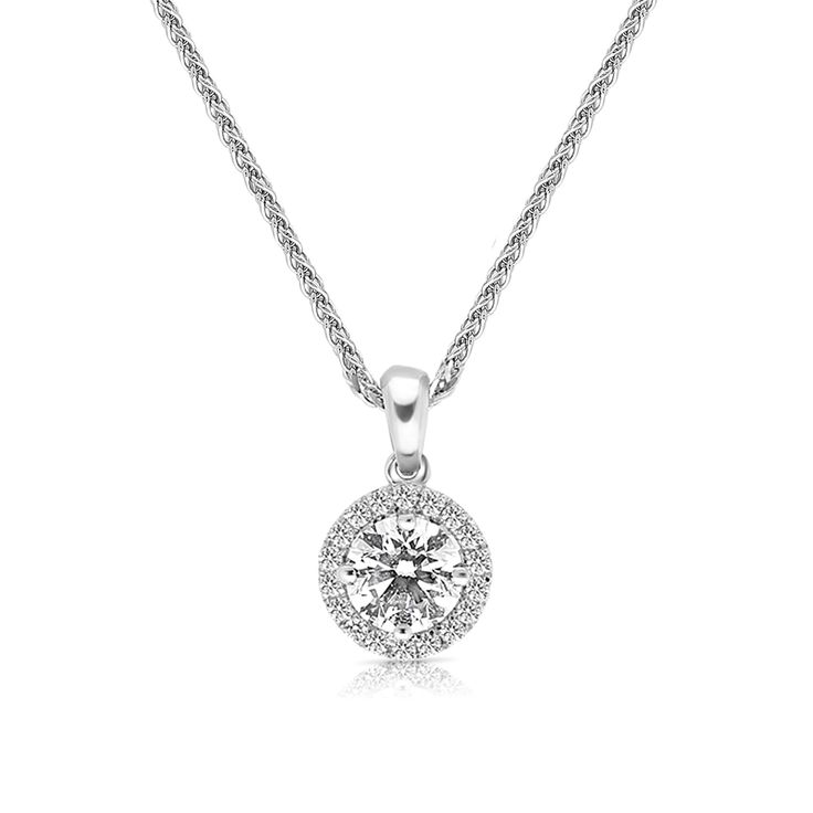 Surprise the one you adore with this classic 18K white gold Diamond Halo Pendant Necklace. The shimmering pendant showcases a classic round brilliant cut diamond artfully set to enhance size and sparkle - wrapped in a pave-lined white diamond halo. This radiant look is one she'll turn to often, everyday and on special occasions. An amazing and thoughtful anniversary gift for your loved one
0.50 carat round brilliant cut F VS1 -CGL report
0.09 carat pave
18k white gold
The Pendant desig Dazzling Silver Solitaire Necklace With Halo Design, Sterling Silver Diamond White Necklace With Halo Design, Dazzling Cubic Zirconia Diamond Necklace With Halo Design, White Solitaire Necklace With Halo Design In Sterling Silver, White Sterling Silver Solitaire Necklace With Halo Design, Diamond White Solitaire Necklace With Halo Design, Classic Diamond White Necklace With Halo Design, Classic Diamond Necklace With Halo Round Cut, Formal Solitaire Pendant Necklace With Halo Design