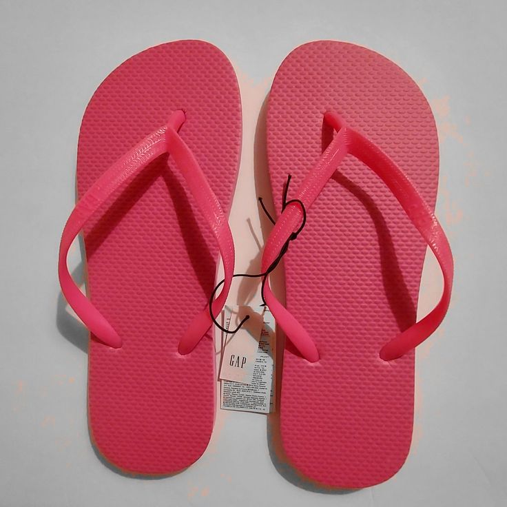 Step Into Easy Style And Comfort With These Barbie-Pink Flip Flops From Gap Featuring A Simple Silhouette With Logo On Straps And A Cushioned Flat Sole. Toss Them In Your Tote For Your Next Beach Day Or In Your Gym Bag For After Your Workouts. These Flip-Flops Are Made Partially From Renewable Sugarcane Plants That Help Reduce Our Use Of Fossil Fuels And Our Carbon Footprint. New With Tags Size: 8 Color: "Standout Pink" Smoke-Free Home Feel Free To Ask Any Questions 3 For $19 Deal When Bundled W Pink Flip Flops, Fossil Fuels, Simple Silhouette, Easy Style, Carbon Footprint, Flip Flop, Beach Day, Simple Style, Fossil