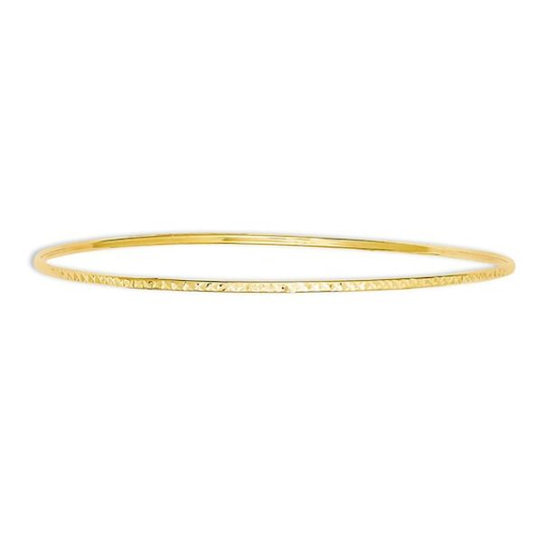 Delicate and refined, this bangle bracelet is a timeless treasure. Crafted in warm 14K gold, this sleek design is enhanced with diamond-cut detailing that offers maximum sparkle potential. She's certain to adore this classic bangle. Polished to a bright shine, this 8.0-inch circumference bracelet slips on and off for easy anytime wear. Elegant Formal Hammered Bangle, Formal Yellow Gold Hammered Bangle, Minimalist Round Gold Bracelet With Diamond Cut, Minimalist Gold Bracelet With Diamond Cut, Elegant 14k Gold Flexible Bangle, Elegant 14k Gold Diamond-cut Bangle, Elegant 14k Gold Bangle With Diamond Cut, Elegant 14k Gold Diamond Cut Bangle, Flexible Yellow Gold Bangle