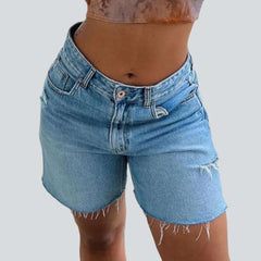 Cut-out leg women's denim shorts Trendy Cutoff Jeans With Built-in Shorts, Trendy Ripped Medium Wash Shorts, Ripped Short Jeans For Summer, Ripped Jeans Shorts For Summer, Trendy High-rise Ripped Shorts, Knee-length Jean Shorts For Summer, Trendy Mid-rise Bermuda Shorts For Summer, Trendy Knee-length Jean Shorts For Spring, Ripped High-waisted Jean Shorts