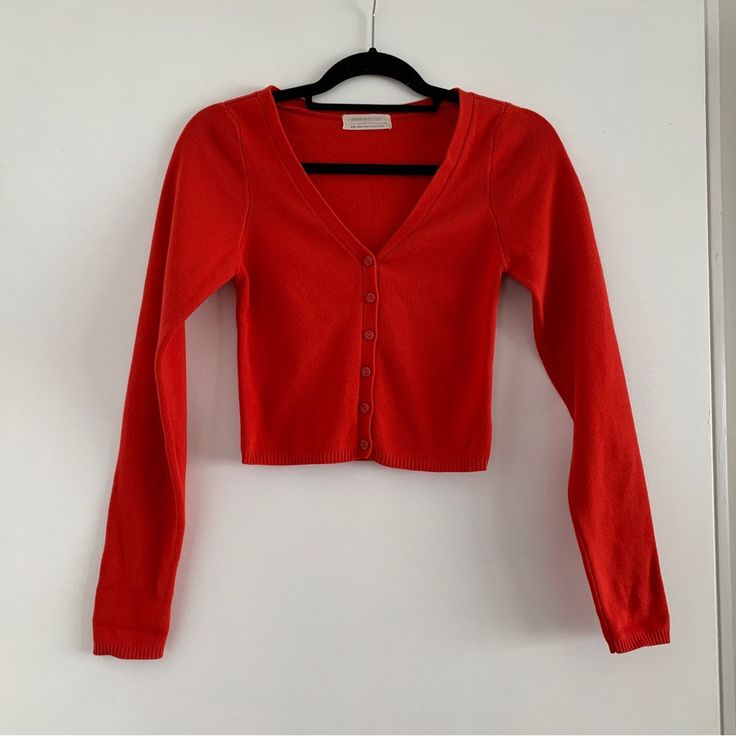 High Quality Cotton Sweater. Thick And Stretchy, Slightly Cropped. From Urban Outfitters, Beautiful Red Color. Brand New, Worn Only To Try On. Missing Tags. Originally $60. Red Crop Cardigan, Trendy Red V-neck Cardigan, Casual Red V-neck Cardigan, Red Fitted V-neck Outerwear, Casual Red Button-up Cardigan, Trendy Red V-neck Sweater, Red V-neck Cardigan For Spring, Red V-neck Spring Cardigan, Fitted Red V-neck Sweater