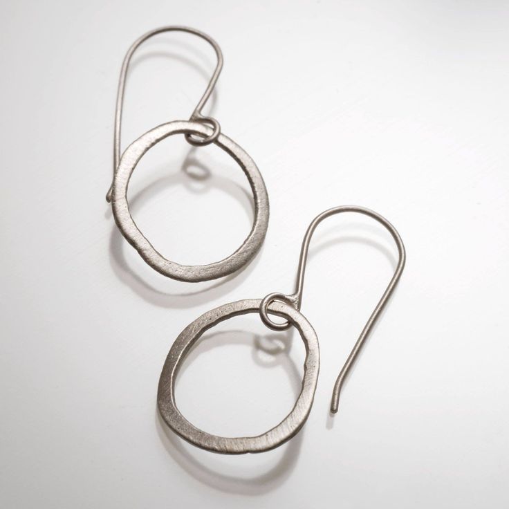 handmade off round earrings in your choice of hook or post Sterling Silver Earrings With Silver Clasp, Nickel Free Sterling Silver Open Circle Jewelry, Silver Hypoallergenic Open Circle Jewelry, Nickel-free Sterling Silver Open Circle Jewelry, Handmade Minimalist Small Hoop Earrings, Handmade Everyday Circle Earrings, Everyday Handmade Circular Earrings, Nickel Free Silver Open Circle Jewelry, Nickel-free Silver Jewelry Open Circle