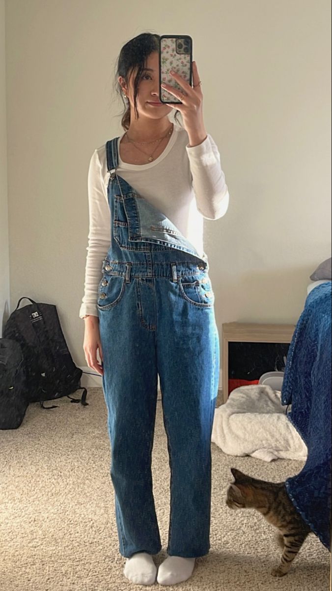 Blue denim overalls with white long sleeve shirt outfit idea summer spring aesthetic Long Denim Overalls, Overalls With White Shirt, Overalls Outfit With Long Sleeve, Long Overalls Outfit Fall, White Long Sleeve Outfit Ideas, Blue Denim Overalls Outfit, Long Sleeve And Overalls Outfit, Denim Overalls Aesthetic, Overalls And Long Sleeves Outfit