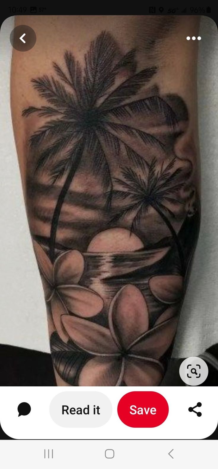 a black and white tattoo on the leg of a man with flowers in front of palm trees