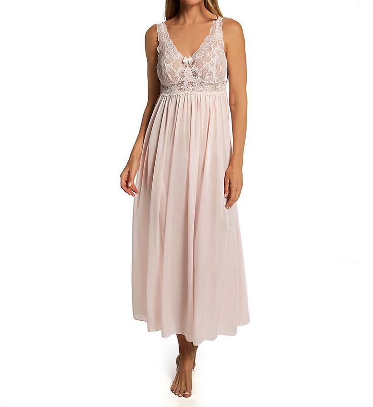 This elegant nightgown features a gorgeous lace bodice with seaming for the bust and a silky, flowing skirt. Stretch floral lace along bodice, straps and neckline. Delicate satin bow with tiny pearl accents at center front. Silky nylon knit is lightweight. Perfect for sleep and lounge. Shadowline's Satintrique nylon tricot fabric is made in the US. Please Note: The Shadowline Silhouette collection is made with Satintrique fabric which is a more sheer fabric. Blush has a different fit style that Elegant Night Dresses With Lace Bodice, Feminine Lace Gown With Delicate Details, Sheer Bodice Dress For Night, Elegant Lace Nightgown With Lace Patchwork, Feminine Lace Gown With Lace Trim, Elegant Lace Patchwork Nightgown, Wedding Night Gown With Lace Trim And Fitted Bodice, Wedding Night Gown With Fitted Bodice And Lace Trim, Wedding Nightgown With Lace Bodice