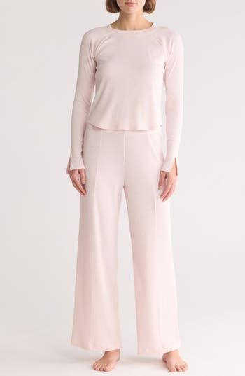 These cotton-kissed pajamas are perfect for lounging around with softly ribbed texturing along the long-sleeve top and matching wide-leg pants. 19 1/2" top length; 29" inseam; 22" leg opening; 12" front rise; 15 1/2" back rise (size Medium) Top has crewneck; long sleeves Pants have concealed-elastic waist 62% polyester, 33% cotton, 5% spandex Machine wash, dry flat Imported Solid Color Sleepwear Long Pants For Loungewear, Solid Color Long Pants Sleepwear For Loungewear, Solid Soft Texture Sleepwear For Loungewear, Solid Color Soft Texture Sleepwear For Loungewear, Solid Color Soft Textured Sleepwear For Loungewear, Soft Texture Solid Color Loungewear Sleepwear, Casual Ribbed Sleepwear For Loungewear, Relaxed Fit Wide Leg Sleepwear For Pajama Party, Ribbed Spring Sleepwear