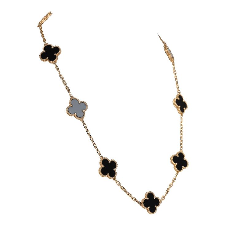 This Van Cleef & Arpels Vintage Alhambra 10 Motif Necklace is in 18k gold with 10 onyx motifs and a lobster claw clasp.Origin: FranceCondition: New and never wornAccompanied by: VCA green jewelry box, box and authenticity card Measurements: 16.5" x .5" Elegant Black Enamel 14k Gold Necklace, Elegant 14k Gold Necklace With Black Enamel, Formal Black Gold-plated Necklace, Formal Black Gold Plated Necklace, Classic Black Jewelry With Clavicle Chain, Classic Black Clavicle Necklace, Luxury 14k Gold Jewelry With Black Enamel, Luxury Black 14k Gold Jewelry With 17 Jewels, Elegant Yellow Gold Necklaces With Black Enamel