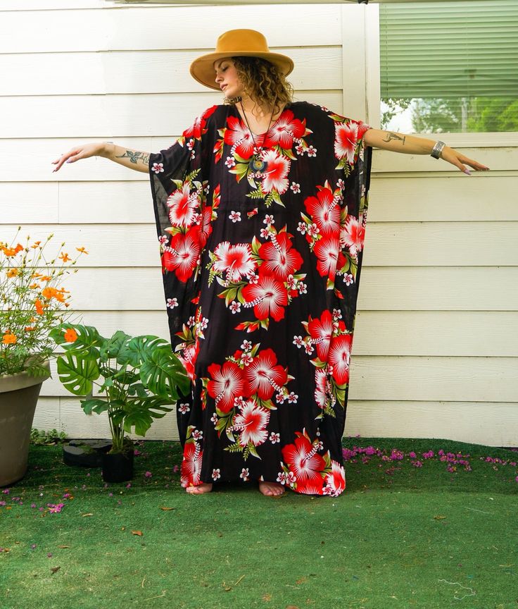 Embrace the essence of summer with our Hibiscus Floral Boho Kaftan Dress. This handmade kaftan, ideal for beachwear, loungewear, and as a swimsuit cover-up, captures the tropical Hawaiian vibe. Crafted from premium rayon, it promises comfort and style in equal measure.  Features ‣ Boho/Hippie/Hawaiian/Beach/Tropical Theme: Perfect for a relaxed, stylish look suitable for various occasions. ‣ Loose Fit: Designed to provide maximum comfort with a relaxed fit. ‣ Adjustable Rope: Features an adjustable rope around the waist to customize the fit. ‣ One Size Fits Most: Suitable for US Women's sizes M-3XL, offering versatility and comfort. ‣ Premium Rayon Fabric: Breathable and comfy for all-day wear. Generous Measurements: ‣ Bust: Fits 60"-90" ‣ Length of Dress: 55" ‣ Width of Dress: 45" ‣ Ident Tropical Red Beach Dress, Red Tropical Print Dress For Beach, Red Tropical Print Dress For The Beach, Red Tropical Maxi Dress For Beach Season, Red Tropical Style Beach Cover-up Dress, Tropical Style Red Beach Cover-up Dress, Red Tropical Beach Cover-up Dress, Tropical Red Beach Cover-up Dress, Red Hawaiian Beach Dress