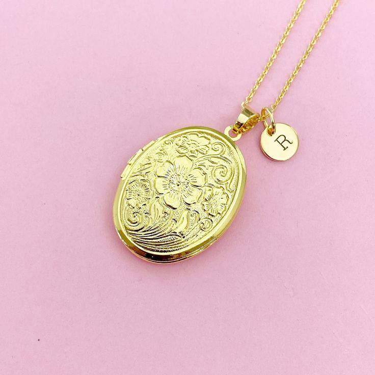 This is gold tone locket charm with hand stamped initial charm on brass or stainless-steel chain.  I do not put the photo to the locket ♥ You will receive ONE necklace. HOW TO ORDER 1) Choose the quantity. 2) Choose the initial in the option or add a note to seller at checkout. 3) Add to the cart. DESCRIPTION ♥ Necklace, Stainless Steel Chain with Lobster Claw Clasp, Size: about 17.7 inches (45cm) long, 1-2mm wide, Nickel Safe, *stainless steel is durable, highly resistant to rust and corrosion. Gold Oval Locket Necklace For Personalized Gift, Gold Oval Pendant Locket Necklace For Personalized Gift, Oval Gold Locket Necklace For Personalized Gift, Personalized Gold Locket Necklace With Oval Pendant, Gold Locket Necklace, Gift For Mom, Gold Locket Necklace Gift For Mom, Gold Jewelry With Flower Charm Keepsake, Personalized Gold Locket Necklace For Mom, Stamped Brass Charm Necklaces As Gift