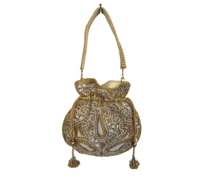 Indian Potli Bags For Parties, Wedding And Festivals, Pearl Evening Bag With Wrist Strap, Pearl Drawstring Bags The potli bag holds a significant place in the cultural heritage of ancient Bhopal, linking back to early tribal traditions that crafted ornaments from various materials. Initially recognized by the Begums (Female Rulers), who added a Persian touch, the craft has evolved into an integral aspect of Nawabi Culture. Today, the beaded potli bags are part of the rich cultural heritage of th Beige Rectangular Potli Bag For Festivals, Handmade Beige Bags For Festive Occasions, Festive Beige Pouch Shoulder Bag, Beige Rectangular Bag For Festivals, Elegant Festival Bags Suitable For Gifts, Elegant Festival Bags For Gifts, Elegant Festival Gift Bags, Festive Beige Pouch Bag, Traditional Handheld Beige Shoulder Bag