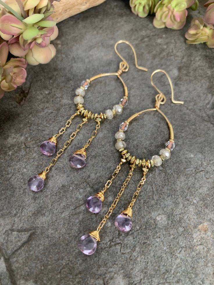 Romantic vibe beaded hoop earrings ..  crafted with hand forged gold tone hoops beaded with Czech beads and African brass beads with pretty faceted gold tone chain accents and hand wire wrapped Pink Quartz gemstones . These lovelies measure 3.5 inches in length . Beaded 14k Gold Filled Dangle Earrings, Bohemian 14k Gold-filled Beaded Dangle Earrings, Bohemian 14k Gold Filled Beaded Dangle Earrings, Bohemian 14k Gold Filled Beaded Earrings, 14k Gold Filled Beaded Dangle Earrings, Beaded Chain Dangle Chandelier Earrings For Gift, Bohemian Gold Earrings With Beaded Chain, Bohemian 14k Gold-filled Beaded Earrings, Wire Wrapped Brass Chandelier Dangle Earrings