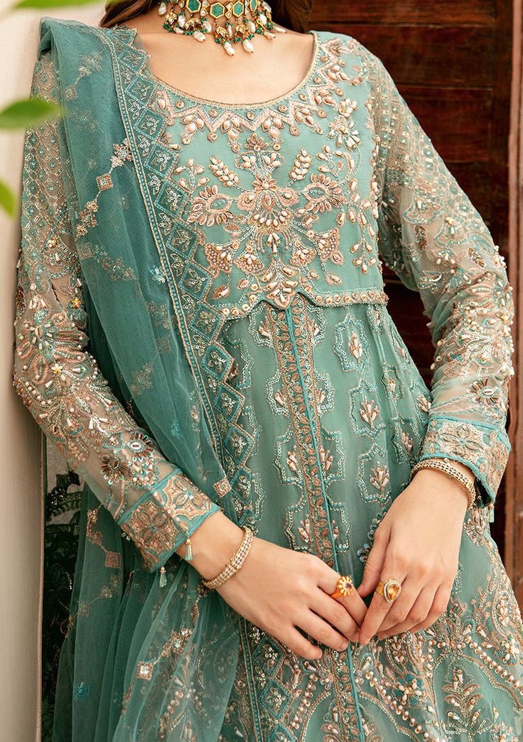 Introducing our Luxury Wedding Collection by Ramsha to make you look and feel your best These pieces will add a touch of class and elegance to your wardrobe. This collection is a beautiful collection of ensembles offering versatile compositions for the latest festive wardrobe requirements. Embroidered Handmade Front Body Embroidered Back Body With Sequence Embroidered Handmade Front And Back Kali With Sequence Embroidered Handmade Sleeve With Sequence Embroidered Dupatta With Sequence Raw Silk For Lining Raw Silk Trouser. Color: There might be slight color variation due to lighting and flashes during the photo shoot. The color may also vary because of different screen resolutions. Wash Care: Dry Clean Only. Semi-stitched Floor-length Traditional Wear For Festive, Semi-stitched Floor-length Traditional Wear For Festive Occasions, Designer Semi-stitched Anarkali Set With Resham Embroidery, Semi-stitched Floor-length Sharara For Eid, Semi-stitched Floor-length Traditional Wear For Eid, Semi-stitched Maxi Anarkali Set For Wedding, Semi-stitched Floor-length Salwar Kameez For Transitional Seasons, Eid Anarkali Salwar Kameez With Intricate Embroidery, Party Anarkali Set With Intricate Embroidery For Eid