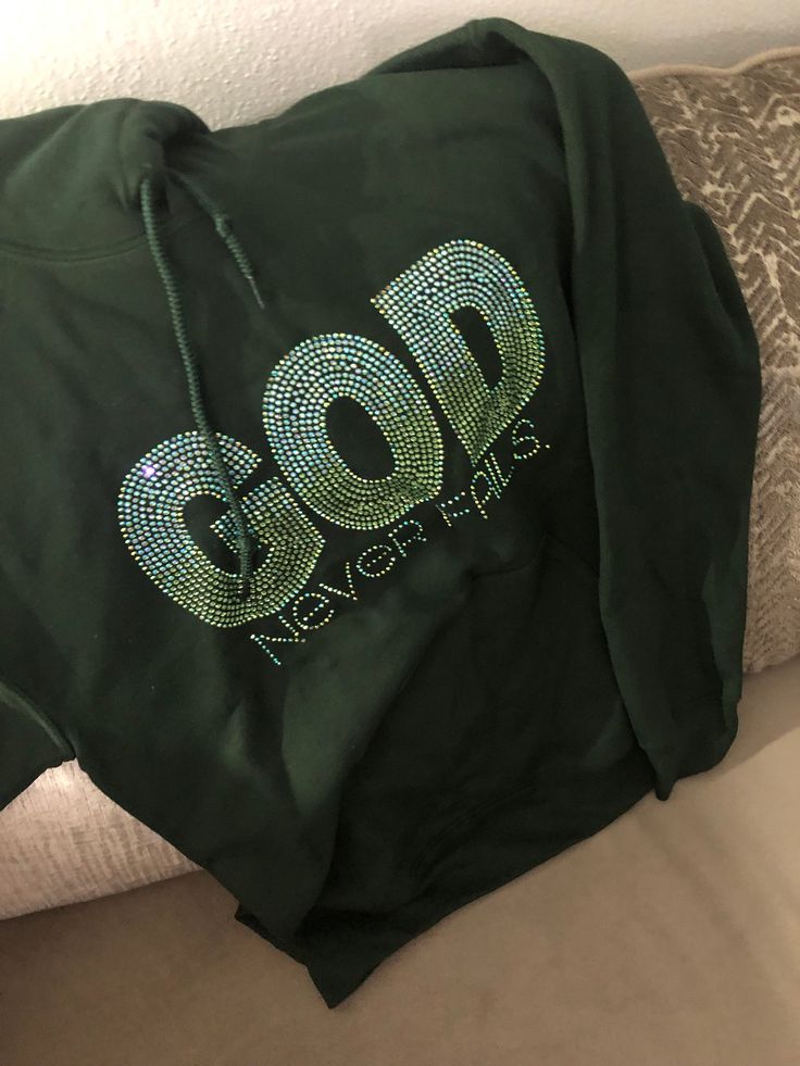 God Never Fails Rhinestone Hoodie is available in unisex sizes small to 5X. Two-Tone Rhinestone colors. Made on demand by me. Fabric: 50% cotton, 50% Polyester preshrunk Wash Instructions: Launder inside out, cold water, tumble or hang dry. Due to the nature of custom garments no return or exchanges allowed unless the garment is defective. Fall Hoodie With Rhinestones, Fall Rhinestone Hooded Hoodie, Fall Rhinestone Hoodie, Rhinestone Hooded Hoodie For Streetwear, Rhinestone Hoodie For Streetwear, Hooded Rhinestone Hoodie For Streetwear, Streetwear Hoodie With Rhinestones, Winter Rhinestone Hoodie For Streetwear, Winter Hoodie With Rhinestones