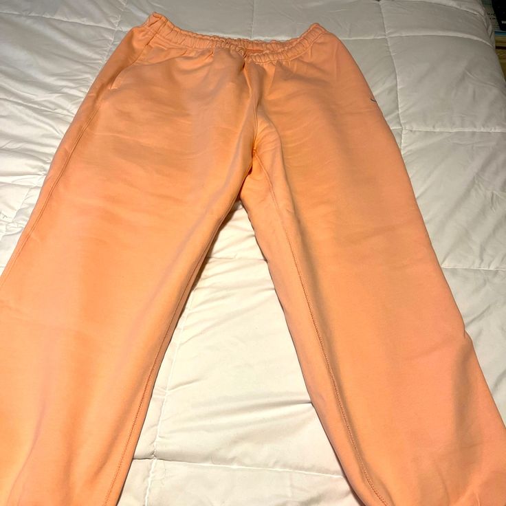 Nwt Nike Sweats Size Xl Peach Color- The Camera Didn’t Pick Up What A Great Color These Are! Zippered Pockets Drawstring Waist Exercise Or Lounge In These Comfy Thick Sweats Bought In Switzerland So I Can’t Return Them - My Loss Is Your Gain! Casual Peach Pants For Spring, Spring Peach Bottoms For Loungewear, Nike Casual Pants For Spring, Casual Peach Bottoms For Spring, Nike Bottoms For Spring Loungewear, Nike Pink Pants For Loungewear, Nike Pink Lounge Pants, Nike Pink Loungewear Pants, Spring Nike Pants